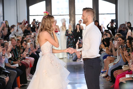 NEW YORK, NY - APRIL 14: Model Nicole Kaspar was surprised when her boyfriend Chad Stapleton proposed to her during Watters Bridal Spring 2019 fashion show, April 14, 2018 in New York City.のeditorial素材