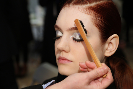 NEW YORK, NY - APRIL 13: A model getting ready backstage before the Berta Bridal Spring 2019  Fashion show on April 13, 2018 in New York City.のeditorial素材