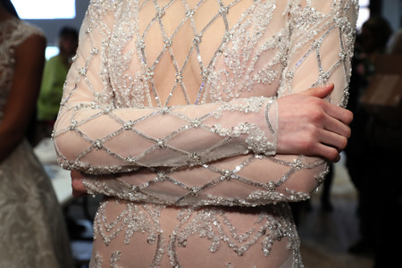 NEW YORK, NY - APRIL 13: A model posing backstage before the Berta Bridal Spring 2019  Fashion show on April 13, 2018 in New York City.のeditorial素材