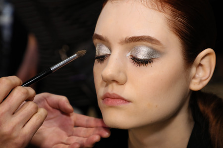 NEW YORK, NY - APRIL 13: A model getting ready backstage before the Berta Bridal Spring 2019  Fashion show on April 13, 2018 in New York City.のeditorial素材