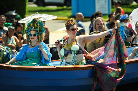 NEW YORK, NY - JUNE 16: People participate in the 36th annual Mermaid Parade in Coney Island on June...