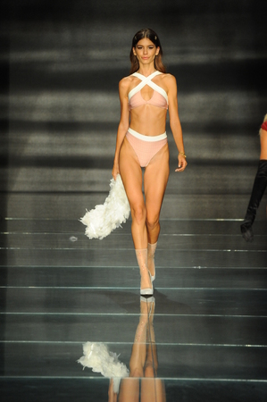 MIAMI BEACH, FL - JULY 15: A model walks the runway for Kya Swim during the Paraiso Fasion Fair at The Paraiso Tent on July 15, 2018 in Miami Beach, Florida.のeditorial素材