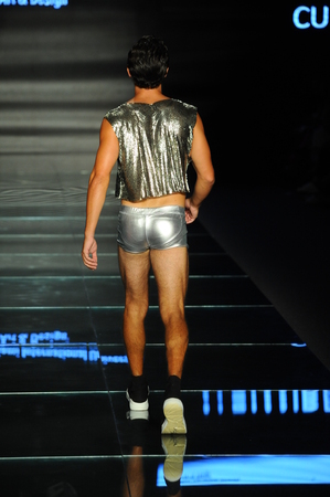 MIAMI BEACH, FL - JULY 12: A model wears fashions by design students of Miami International University of Art and Design during the Paraiso Fashion Fair at The Paraiso Tent on July 12, 2018 in Miami Beach, Florida.のeditorial素材