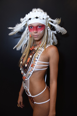 MIAMI BEACH, FL - JULY 12: A model posing backstage for Principessa Art Presentation during the Art...