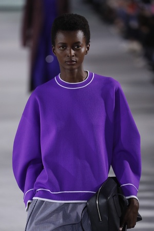 NEW YORK, NY - FEBRUARY 11: A model walks the runway wearing Tibi Fall 2018 at Pier 17 on February...