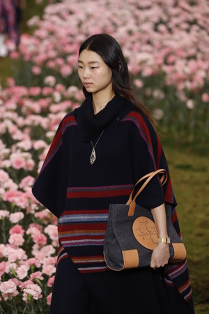 NEW YORK, NY - FEBRUARY 09: A model walks the runway during the Tory Burch Fall Winter 2018 Fashion...