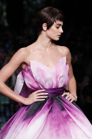 MILAN, ITALY - SEPTEMBER 21: Taylor Hill walks the runway at the Moschino Ready to Wear Spring/Summer 2018 fashion show during Milan Fashion Week Spring/Summer 2018 on September 21, 2017 in Milan, Italy.のeditorial素材