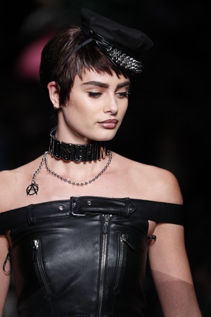 MILAN, ITALY - SEPTEMBER 21:  Taylor Hill walks the runway at the Moschino Ready to Wear...