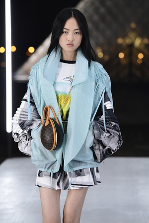 PARIS, FRANCE - OCTOBER 02: A model walks the runway during the Louis Vuitton show as part of the...