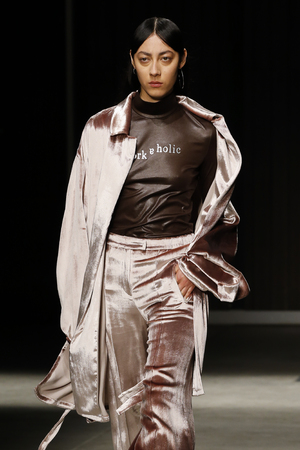 MILAN, ITALY - FEBRUARY 20: A model walks the runway at the Ricostru Ready to Wear Fall/Winter 2019-2020 fashion show during Milan Fashion Week Autumn/Winter 2019/20 on February 20, 2019 in Milan, Italy.のeditorial素材