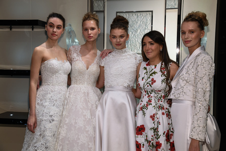 NEW YORK, NY - APRIL 10: Designer Gracy Accad and Models posing for photographers  during the Gracy Accad Spring 2020 bridal presentation at Blumingdales store on April 10, 2019 in NYC.のeditorial素材