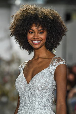 NEW YORK, NY - APRIL 11: A model walks the runway during the Morilee by Madeline Gardner Spring 2020 bridal fashion show at New York Fashion Week: Bridal on April 11, 2019 in NYC.のeditorial素材