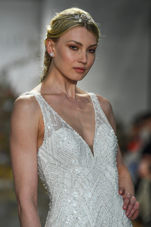 NEW YORK, NY - APRIL 11: A model walks the runway during the Morilee by Madeline Gardner Spring 2020 bridal fashion show at New York Fashion Week: Bridal on April 11, 2019 in NYC.のeditorial素材