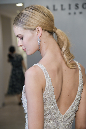 NEW YORK, NY - APRIL 12: A model poses during the Allison Webb Spring 2020 bridal fashion presentation at New York Fashion Week: Bridal on April 12, 2019 in NYC.のeditorial素材