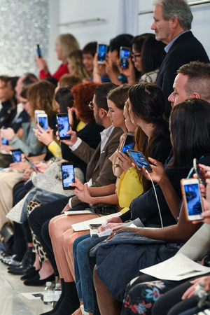 NEW YORK, NY - APRIL 11: A Fashion crowd on front row during the Theia Spring 2020 fashion collection at New York Fashion Week: Bridal on April 11, 2019 in NYC.のeditorial素材