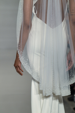 NEW YORK, NY - APRIL 11: A model walks the runway during the Theia Spring 2020 fashion collection at New York Fashion Week: Bridal on April 11, 2019 in NYC.のeditorial素材