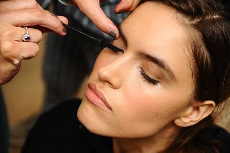 NEW YORK, NY - OCTOBER 5: A model getting ready backstage before the Ines Di Santo Fall 2020 Bridal Runway Show on OCTOBER 5, 2019 in New York City.のeditorial素材