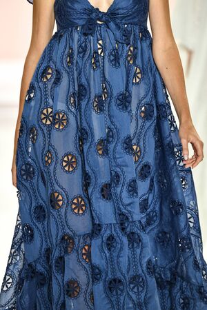 NEW YORK, NEW YORK - SEPTEMBER 11: A model walks the runway for Badgley Mischka during New York...