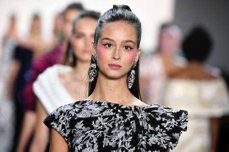 NEW YORK, NEW YORK - SEPTEMBER 05: Models walk the runway finale for Tadashi Shoji Spring/Summer...