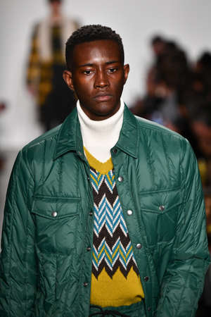 NEW YORK, NEW YORK - FEBRUARY 05: A model walks the runway ay the Todd Snyder fashion show during...