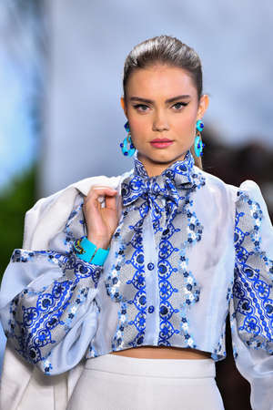 NEW YORK, NEW YORK - SEPTEMBER 11: A model walks the runway for Dennis Basso during New York Fashion...