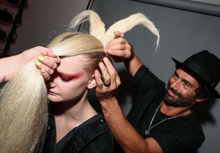 NEW YORK, NEW YORK - SEPTEMBER 10: A model getting ready backstage during Kaimin Ready to Wear Spring/Summer 2020 fashion show during New York Fashion Week on September 10, 2019 in New York City.のeditorial素材