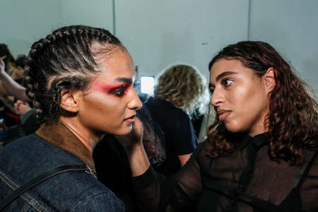NEW YORK, NEW YORK - SEPTEMBER 10: A model getting ready backstage during Kaimin Ready to Wear Spring/Summer 2020 fashion show during New York Fashion Week on September 10, 2019 in New York City.のeditorial素材