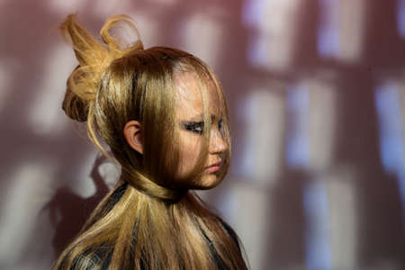 NEW YORK, NEW YORK - SEPTEMBER 10: A model posing backstage during Kaimin Ready to Wear...