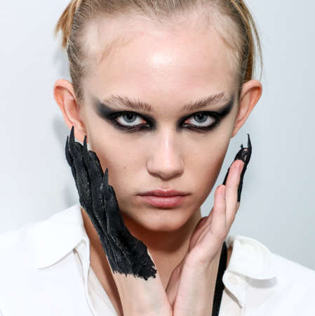 NEW YORK, NEW YORK - SEPTEMBER 10: A model posing backstage during Kaimin Ready to Wear...