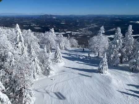 Beautiful day at Okemo mountain with fresh snow and panoramic vews in Vermont USA