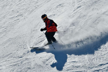People skiing on snowy hill at Breckenridge ski resort. Extreme winter sports. Action shot. Breckenridge, COの写真素材