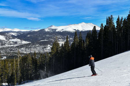 Man skiing on snowy hill at Breckenridge ski resort. Extreme winter sports. Breckenridge , COの写真素材