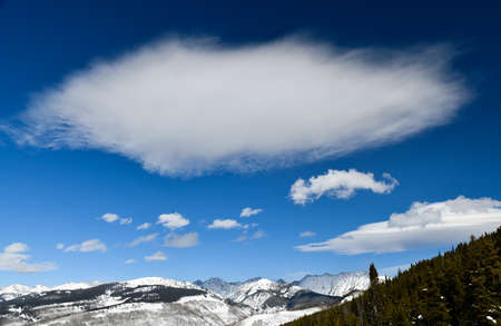 White clouds over Vail ski resort mountains, Colorado USAの写真素材