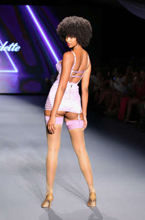 MIAMI BEACH, FLORIDA - JULY 10: A model walks the runway for Honey Birdette At Miami Swim Week during Paraiso Miami Beach at The Paraiso Tent on July 10, 2021 in Miami Beach, Florida.のeditorial素材