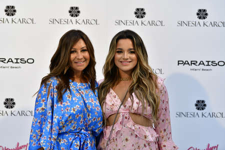 MIAMI BEACH, FLORIDA - JULY 07: Designer Sinesia Karol (L) and guest posing for the Sinesia Karol Miami Swim Week Paraiso Miami Beach Presentation at The Goodtime Hotel on July 07, 2021 in Miami Beach, Florida.のeditorial素材