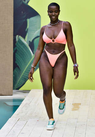 MIAMI BEACH, FLORIDA - JULY 11: A model walks for Maaji: The Spritzer House Spring '22 Runway Show during Paraiso Miami Beach at Plymouth Hotel on July 11, 2021 in Miami Beach, Florida.のeditorial素材