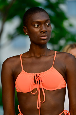 MIAMI BEACH, FLORIDA - JULY 07: A model walks for the Sinesia Karol Miami Swim Week Paraiso Miami Beach Presentation at The Goodtime Hotel on July 07, 2021 in Miami Beach, Florida.のeditorial素材