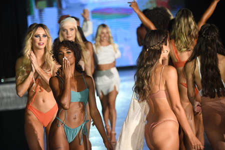 MIAMI BEACH, FLORIDA - JULY 09: Models walk the runway finale  for Almost Naked Swim Show during Miami Swim Week The Shows powered by DCSW on July 09, 2021 in Miami Beach, Floridaのeditorial素材
