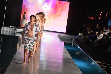 MIAMI BEACH, FLORIDA - JULY 09: Models walk the runway finale  for Ayittikini Show during Miami Swim Week The Shows powered by DCSW on July 09, 2021 in Miami Beach, Floridaのeditorial素材