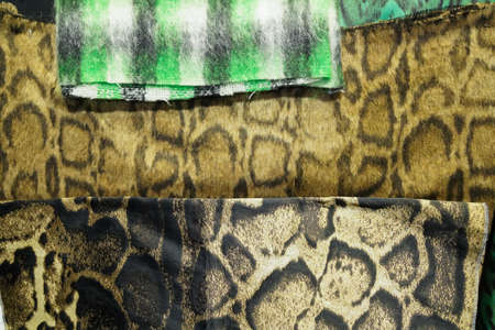MILAN, ITALY - FEBRUARY 23: Close-up of fabrics backstage at the Roberto Cavalli fashion show during...