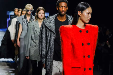 MILAN, ITALY - FEBRUARY 24: Models walk the runway finale at the Annakiki fashion show during the Milan Fashion Week Fall/Winter 2022/2023 on February 24, 2022 in Milan, Italy.のeditorial素材