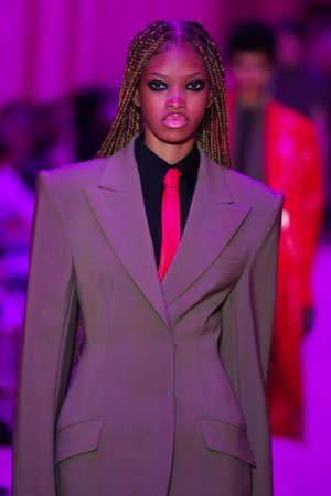 MILAN, ITALY - FEBRUARY 25: A model walks the runway at the Sportmax fashion show during the Milan...