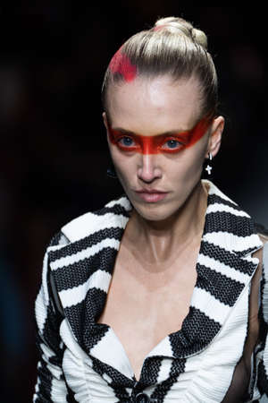 MILAN, ITALY - FEBRUARY 26: A model walks the runway at the Tokyo James fashion show during the...