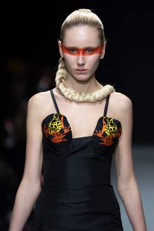 MILAN, ITALY - FEBRUARY 26: A model walks the runway at the Tokyo James fashion show during the Milan Fashion Week Fall/Winter 2022/2023 on February 26, 2022 in Milan, Italy.のeditorial素材