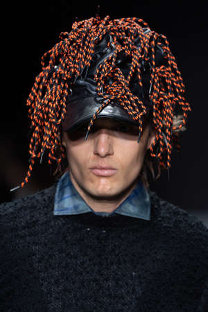 MILAN, ITALY - FEBRUARY 26: A model walks the runway at the Tokyo James fashion show during the...