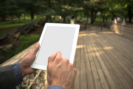 Man with tablet in hands 