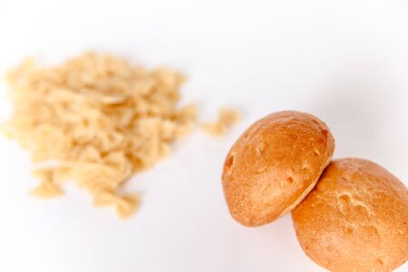 Pasta and bread on a white background. Selection of gluten free food.