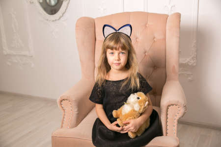 Little beautiful girl with cat ears. Copy spaceの写真素材