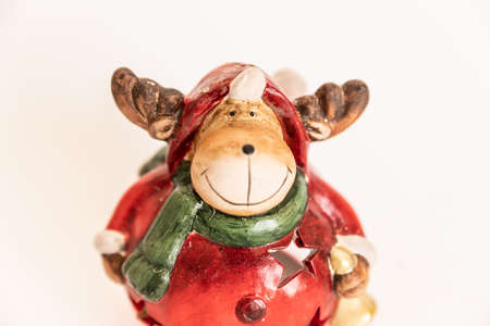 Christmas. New Year's jewelry. toy Christmas deer on an isolated white backgroundの写真素材
