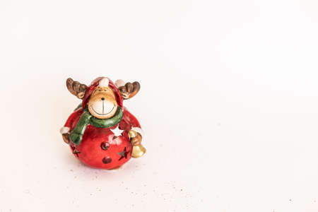 Christmas. New Year's jewelry. toy Christmas deer on an isolated white background. Copy Spaceの写真素材